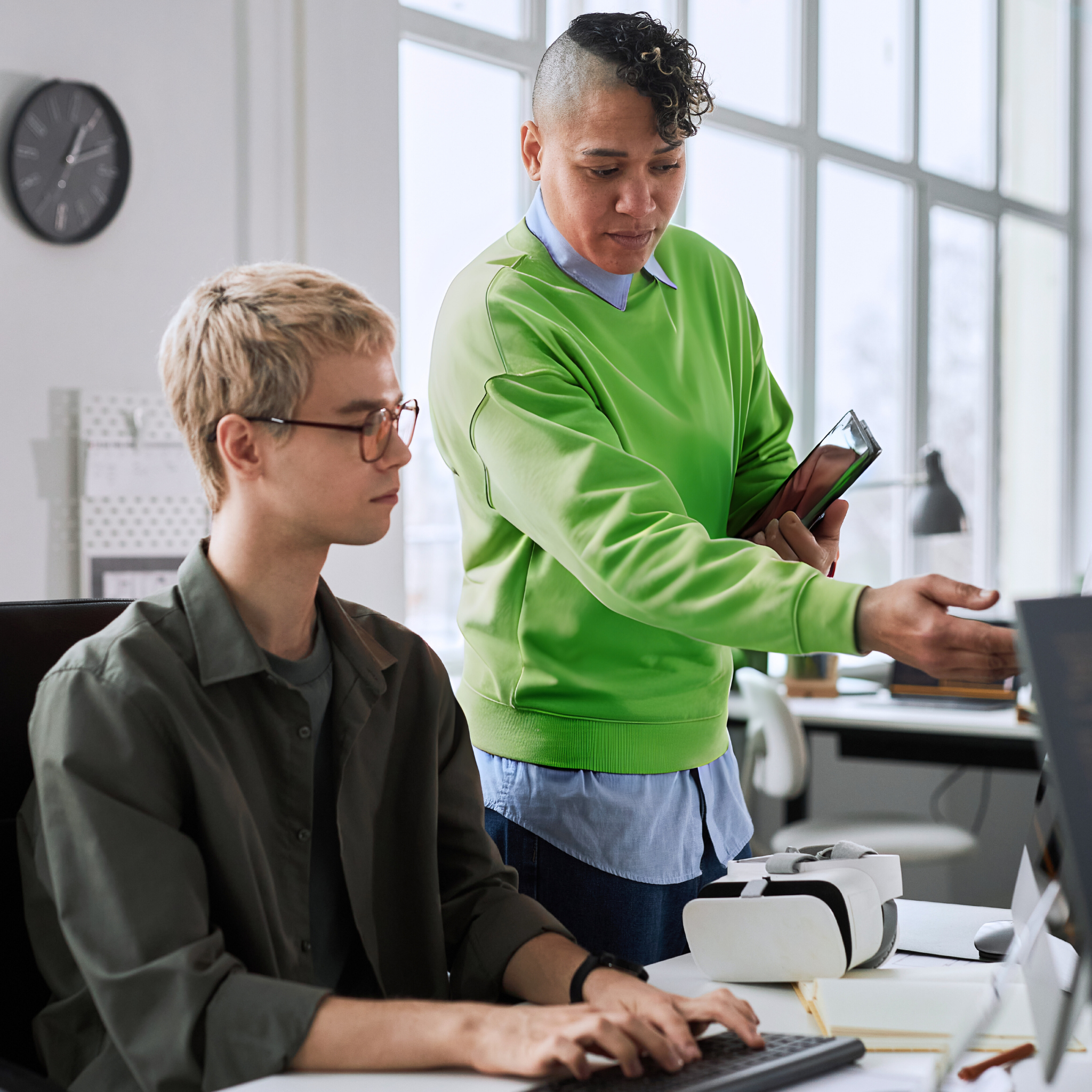 Staffing agency manager using workforce management software to plan seasonal shifts and casual staff scheduling on a digital dashboard.